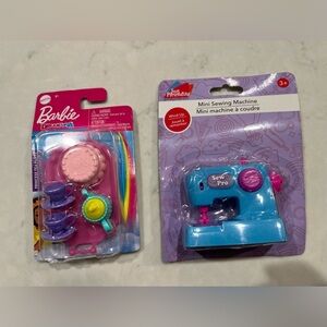 Barbie tea set and a doll sewing  machine.  Accessories
